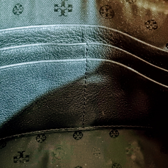 Tory Burch Black Leather Cross body Purse with brass buckle adjustable strap. - Picture 6 of 16